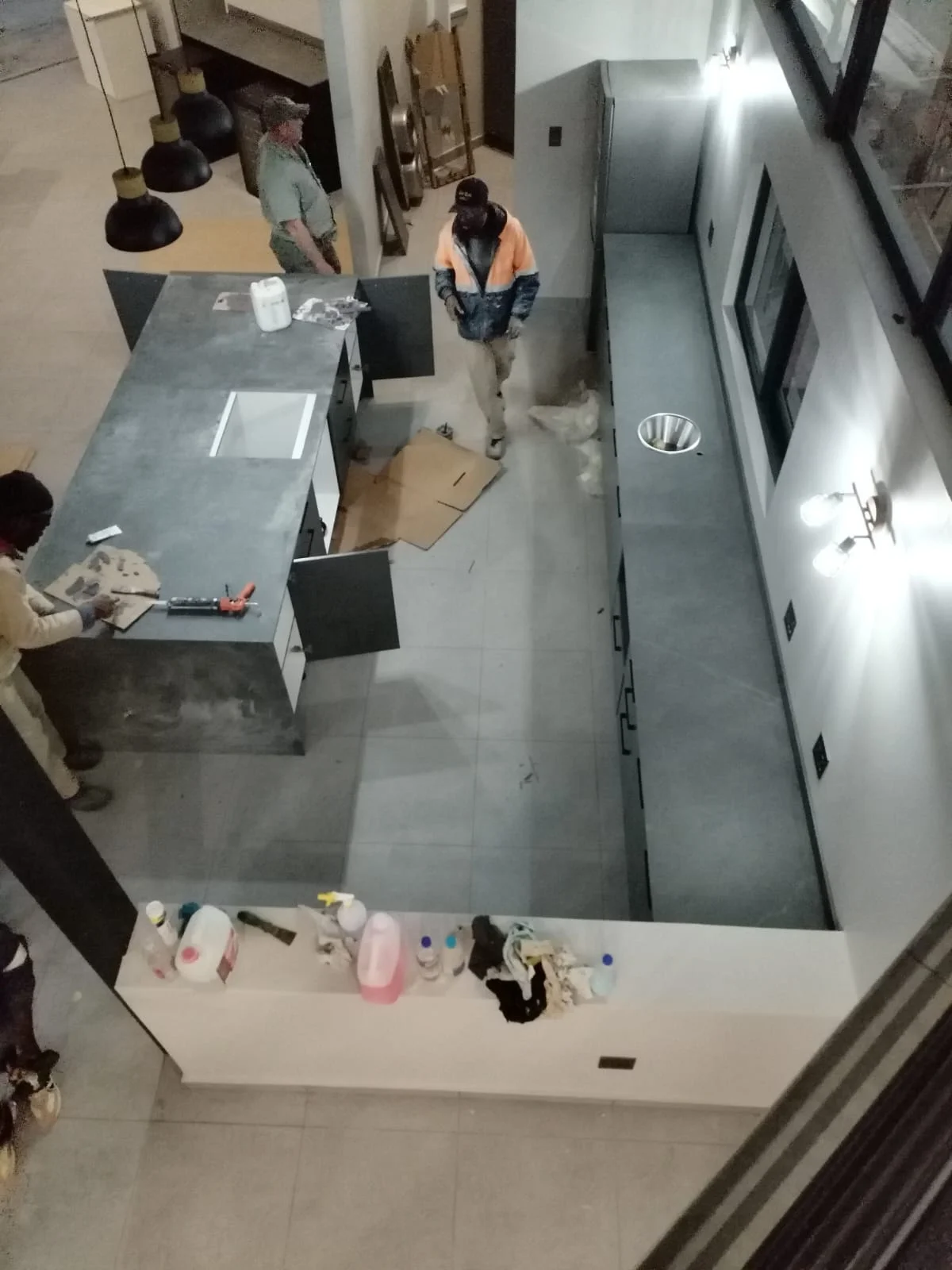 Kitchen installation in progress by Z J Ceiling and Kitchen Masters