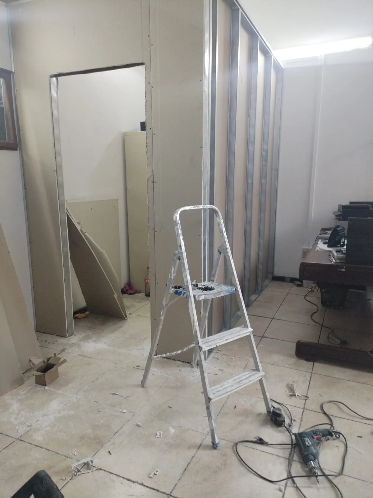 Drywall partition framing and doorway by Z J Ceiling and Kitchen Masters