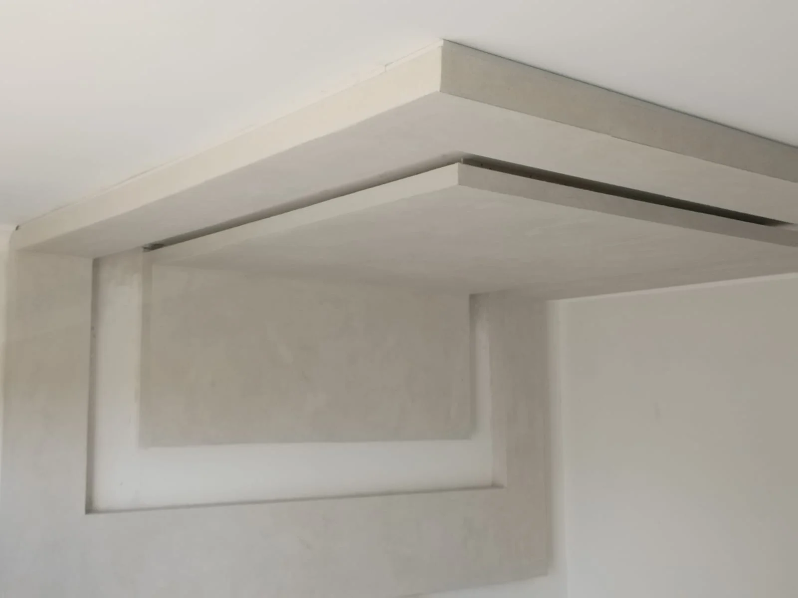 Geometric ceiling bulkhead finish by Z J Ceiling and Kitchen Masters