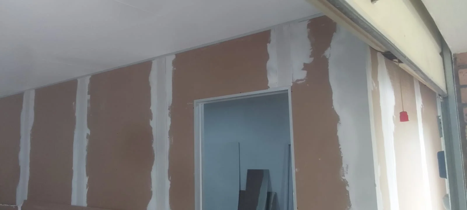 Drywall joint finishing by Z J Ceiling and Kitchen Masters
