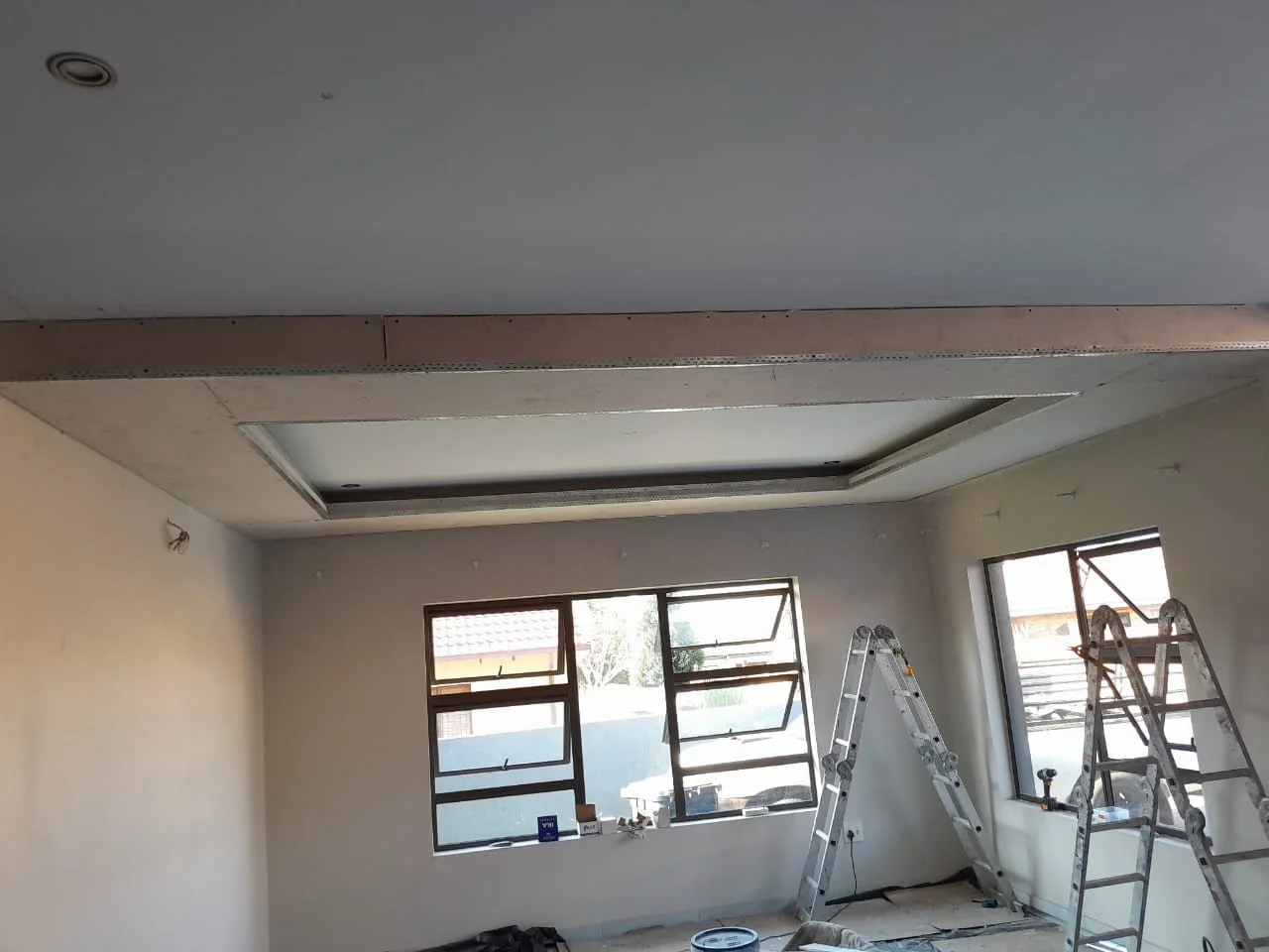 Rectangular bulkhead installation by Z J Ceiling and Kitchen Masters