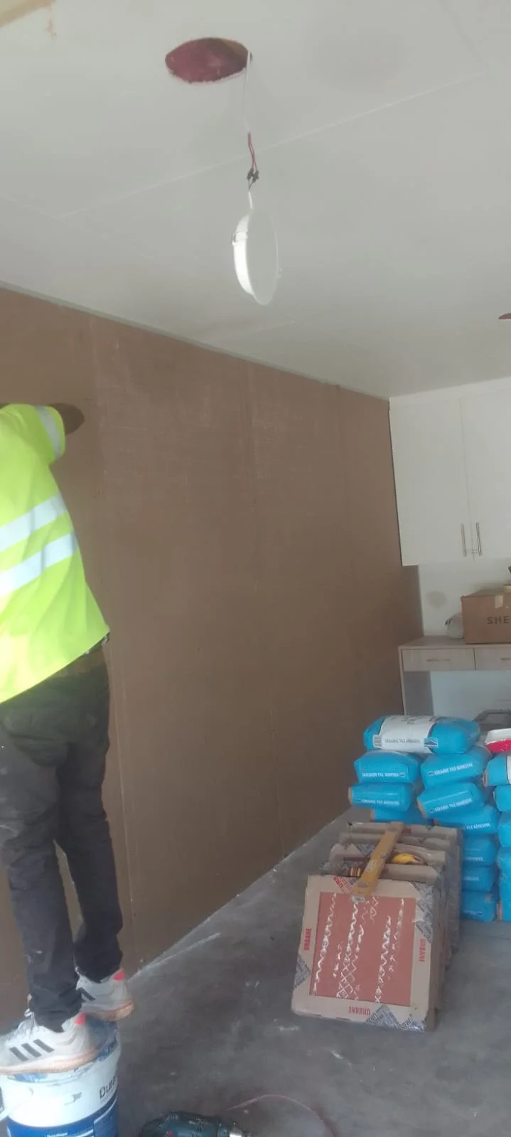 Drywall and ceiling work in progress by Z J Ceiling and Kitchen Masters