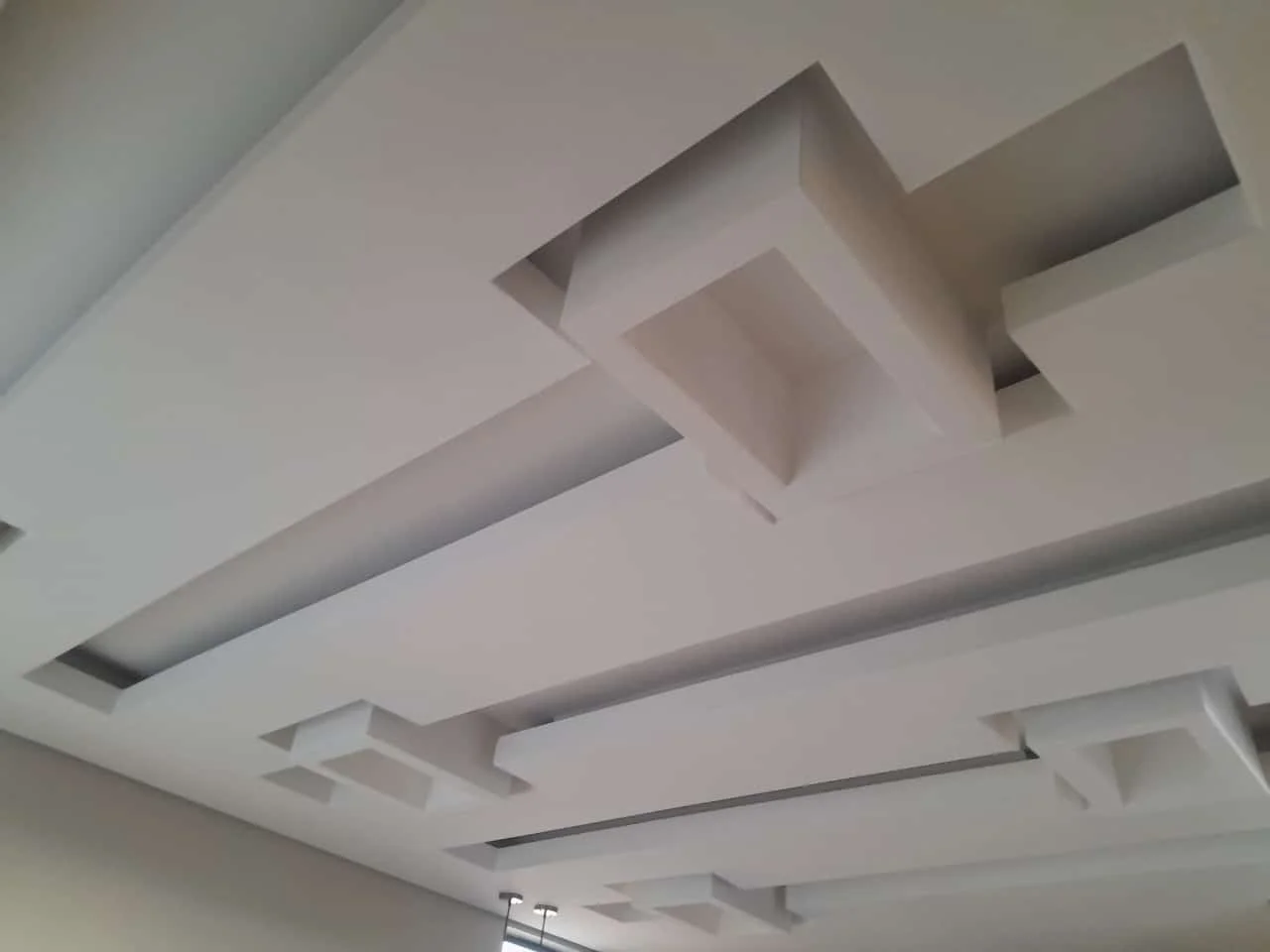 Geometric stepped ceiling by Z J Ceiling and Kitchen Masters