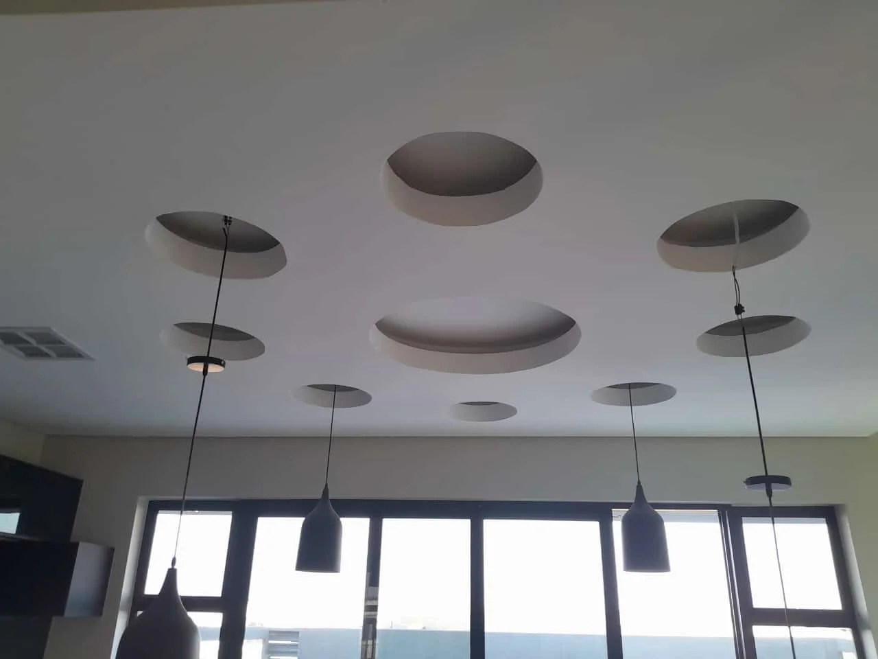 Circular recessed ceiling by Z J Ceiling and Kitchen Masters